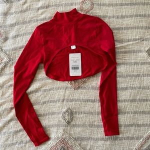red fabletics long sleeve workout crop top